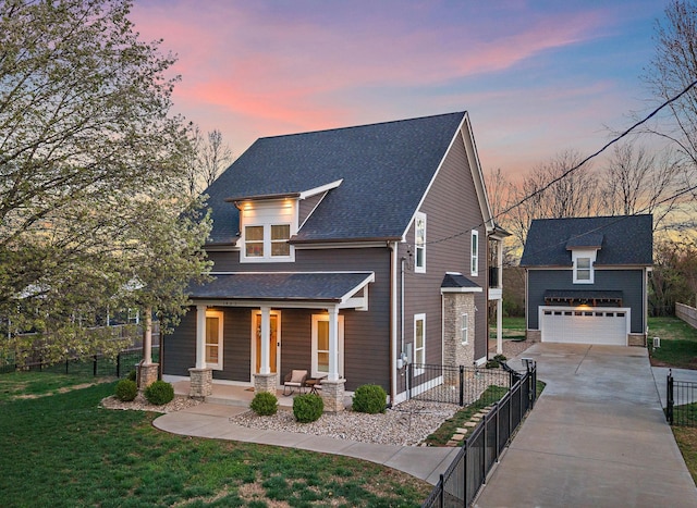 view of front facade featuring an outdoor structure, fence, covered porch, and a garage