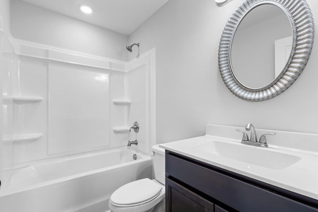 bathroom with washtub / shower combination, toilet, recessed lighting, and vanity