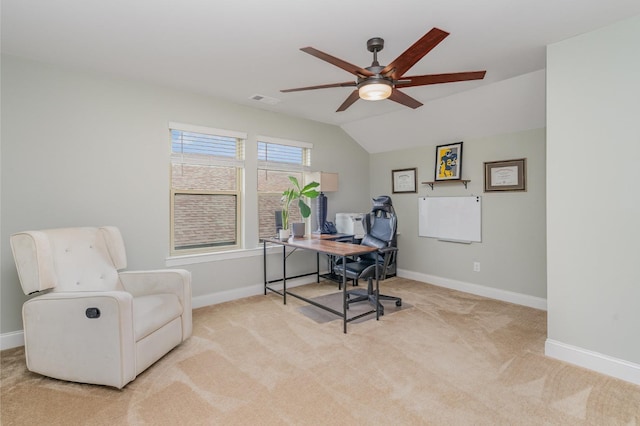 carpeted office featuring baseboards, a ceiling fan, visible vents, and lofted ceiling