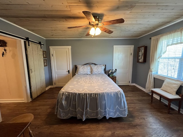 bedroom featuring dark wood-style floors, crown molding, a barn door, wood ceiling, and baseboards