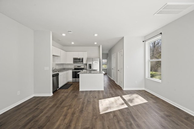 810 Dallas Dr, Columbia, TN 38401 - kitchen featuring a sink, dark wood-style floors, visible vents, and stainless steel appliances