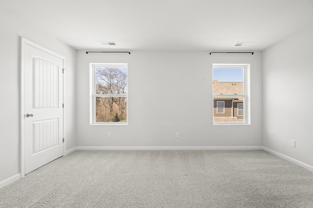 810 Dallas Dr, Columbia, TN 38401 - spare room with baseboards, visible vents, and carpet floors