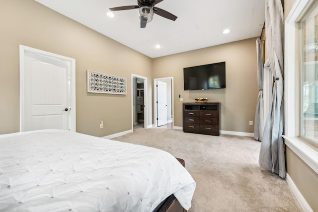 bedroom featuring light colored carpet, baseboards, a ceiling fan, and recessed lighting