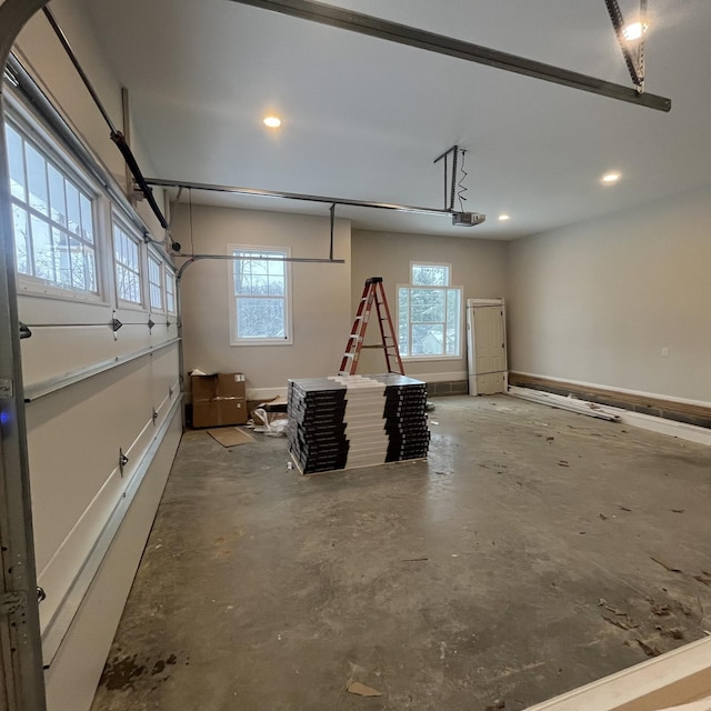 1168 N Franklin Ave, Cookeville, TN 38501 - garage with recessed lighting, a garage door opener, and baseboards