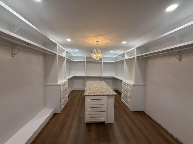 1168 N Franklin Ave, Cookeville, TN 38501 - spacious closet with dark wood-style floors and a chandelier