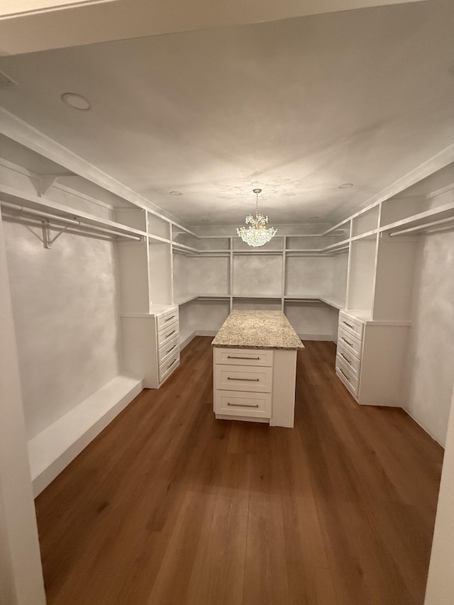 1168 N Franklin Ave, Cookeville, TN 38501 - walk in closet featuring dark wood-style floors and a chandelier