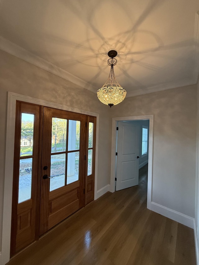 1168 N Franklin Ave, Cookeville, TN 38501 - entrance foyer with dark wood-type flooring, baseboards, ornamental molding, and french doors