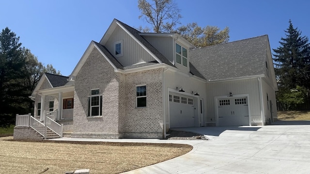 1168 N Franklin Ave, Cookeville, TN 38501 - view of side of property featuring concrete driveway, roof with shingles, and brick siding