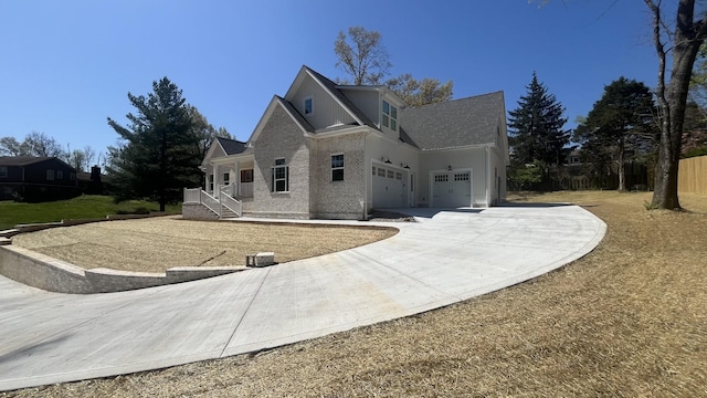 1168 N Franklin Ave, Cookeville, TN 38501 - view of front of home with driveway, an attached garage, and covered porch