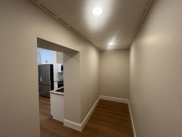 1168 N Franklin Ave, Cookeville, TN 38501 - corridor with light wood finished floors and baseboards