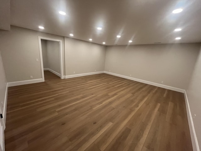 1168 N Franklin Ave, Cookeville, TN 38501 - finished basement featuring dark wood-style flooring, baseboards, and recessed lighting