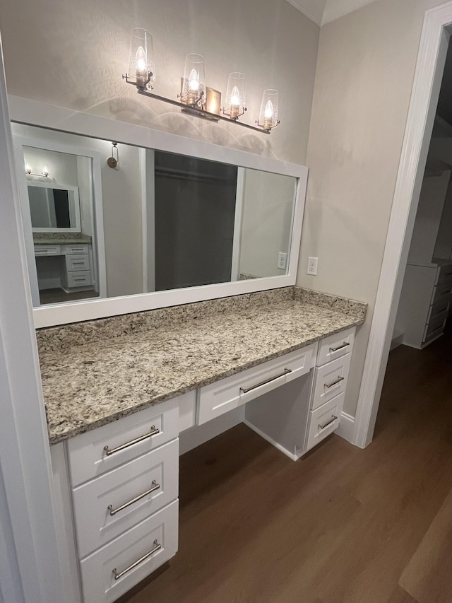 1168 N Franklin Ave, Cookeville, TN 38501 - bathroom with wood finished floors, vanity, and baseboards
