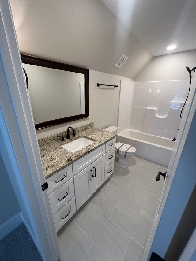 1168 N Franklin Ave, Cookeville, TN 38501 - full bathroom featuring vanity, toilet, lofted ceiling, shower / washtub combination, and marble finish floors