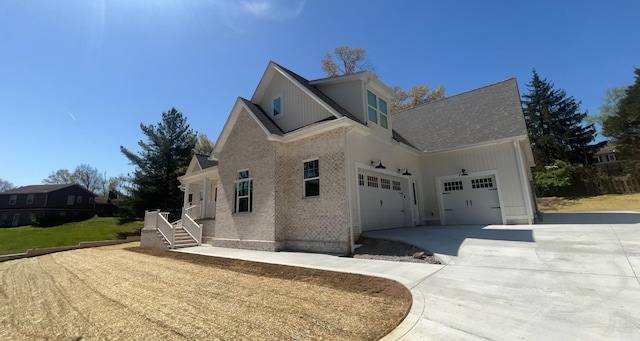1168 N Franklin Ave, Cookeville, TN 38501 - view of home's exterior featuring concrete driveway, brick siding, and a garage