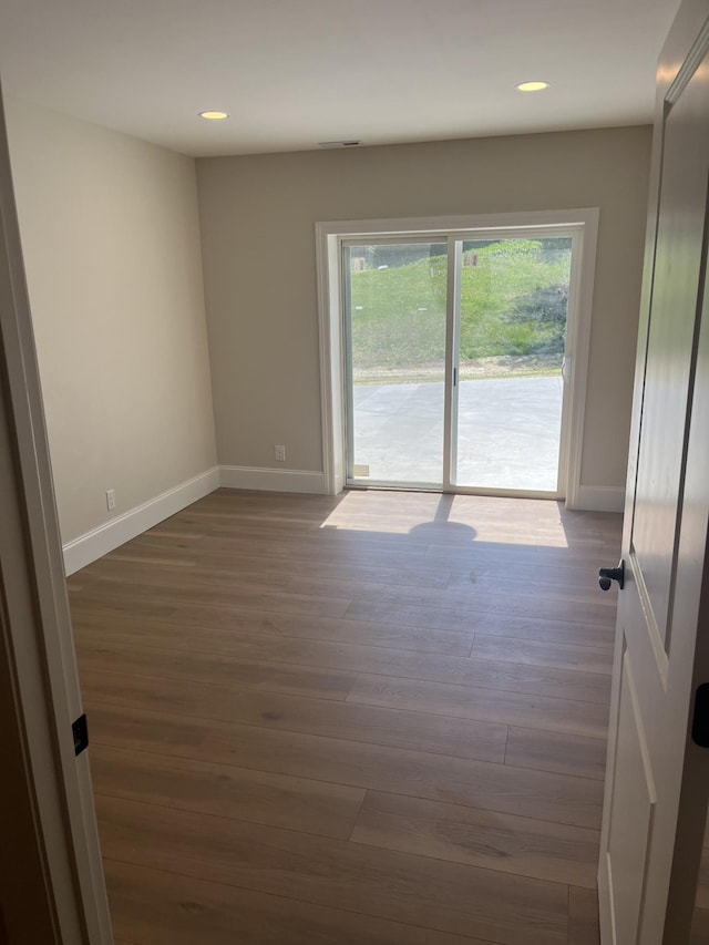 1168 N Franklin Ave, Cookeville, TN 38501 - empty room featuring baseboards, dark wood-style flooring, and recessed lighting