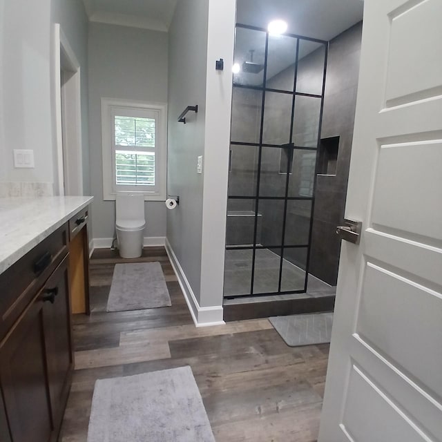 349 Chipman Rd, Bethpage, TN 37022 - full bathroom with vanity, wood finished floors, and tiled shower