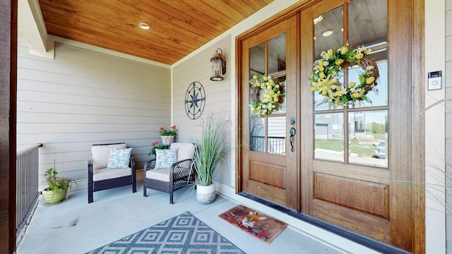 doorway to property with covered porch