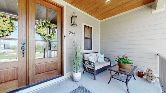 doorway to property featuring a porch