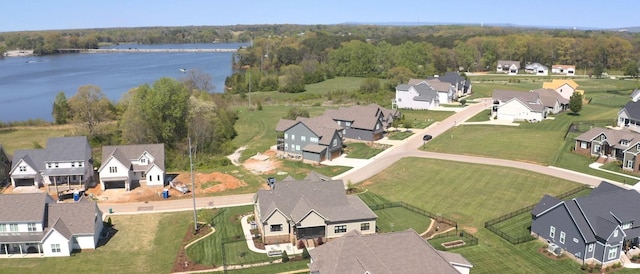 bird's eye view featuring a water view and a residential view