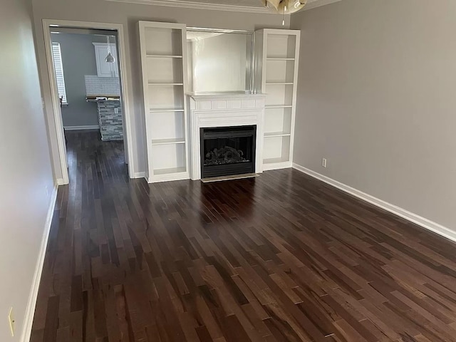 3001 Hamilton Church Rd Unit 216, Antioch, TN 37013 - unfurnished living room featuring baseboards, dark wood-style floors, and a fireplace