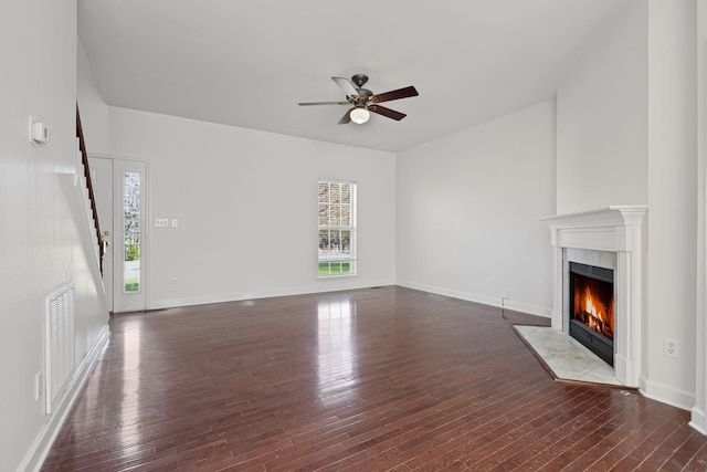 142 Big Ben Ct, Franklin, TN 37067 - unfurnished living room featuring baseboards, a fireplace, visible vents, ceiling fan, and hardwood / wood-style flooring