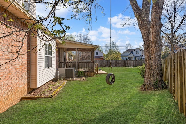 142 Big Ben Ct, Franklin, TN 37067 - view of yard with central AC unit, a fenced backyard, and a sunroom