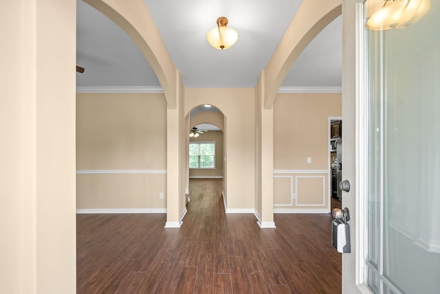 1313 Allmon Dr, Clarksville, TN 37042 - entrance foyer with arched walkways, dark wood-type flooring, crown molding, and ceiling fan
