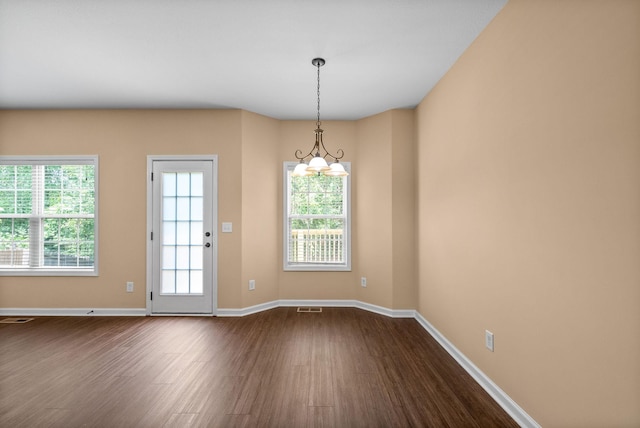 1313 Allmon Dr, Clarksville, TN 37042 - spare room featuring dark wood-style floors and baseboards
