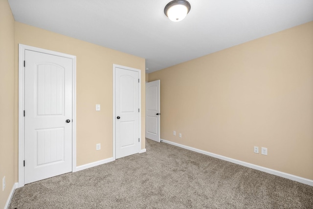1313 Allmon Dr, Clarksville, TN 37042 - unfurnished bedroom featuring carpet floors and baseboards