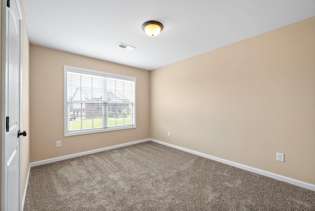 1313 Allmon Dr, Clarksville, TN 37042 - carpeted empty room featuring baseboards