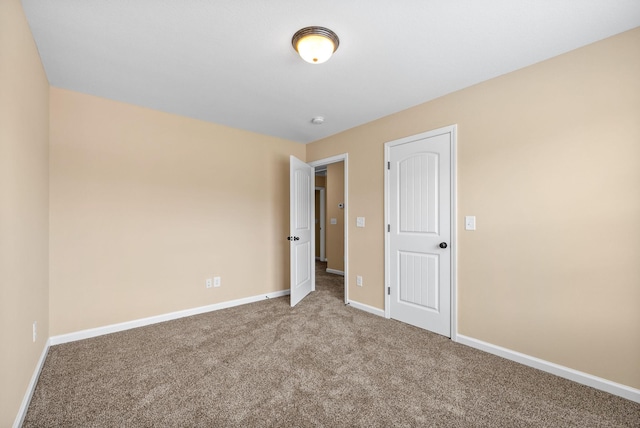 1313 Allmon Dr, Clarksville, TN 37042 - unfurnished bedroom featuring carpet and baseboards