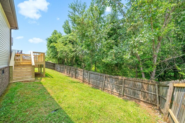 1313 Allmon Dr, Clarksville, TN 37042 - view of yard featuring a deck and stairway