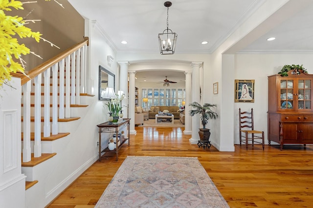 175 Southern Woods Ct, Cookeville, TN 38506 - entrance foyer with ceiling fan, crown molding, ornate columns, recessed lighting, and light wood-style flooring