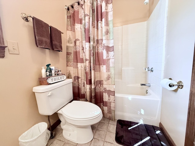 bathroom with toilet, baseboards, and shower / tub combo with curtain