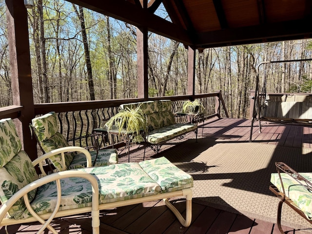 wooden deck featuring an outdoor hangout area