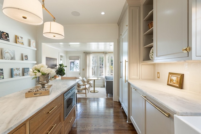 4610 Elkins Ave, Nashville, TN 37209 - kitchen featuring open shelves, stainless steel microwave, ornamental molding, dark wood finished floors, and open floor plan