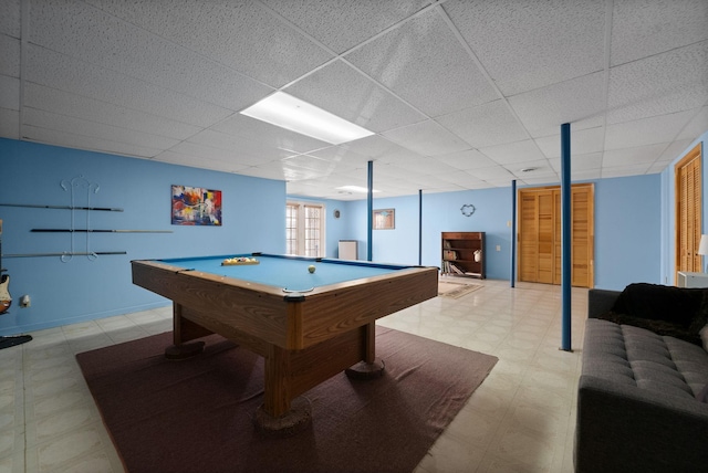 playroom with tile patterned floors, pool table, a drop ceiling, and baseboards