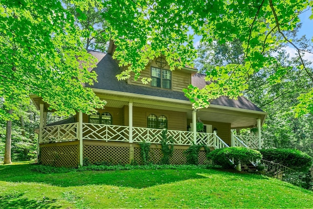4862 Louise Rd, Cumberland Furnace, TN 37051 - view of front facade featuring a front lawn, a porch, and a shingled roof