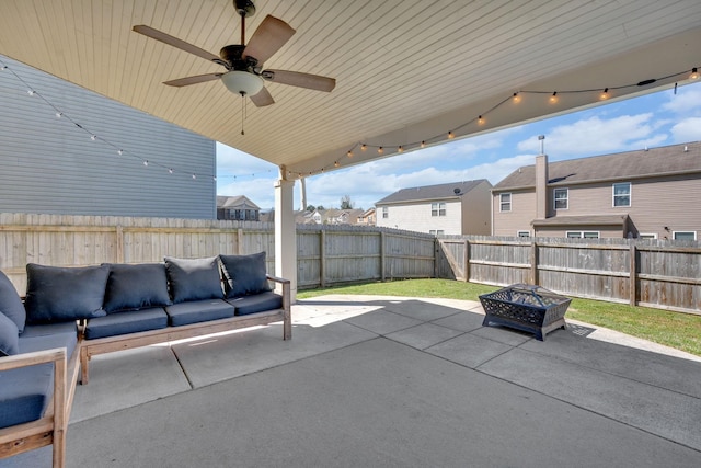 114 Suggs Dr, Lebanon, TN 37087 - view of patio / terrace featuring a fenced backyard, an outdoor living space with a fire pit, and a ceiling fan