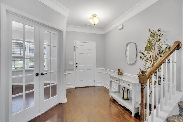 114 Suggs Dr, Lebanon, TN 37087 - foyer entrance featuring crown molding, french doors, a wainscoted wall, and dark wood-type flooring