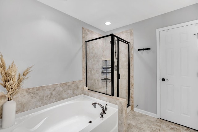114 Suggs Dr, Lebanon, TN 37087 - full bath featuring tile patterned flooring, a bath, a stall shower, and baseboards