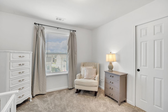 114 Suggs Dr, Lebanon, TN 37087 - living area featuring visible vents, light colored carpet, and baseboards