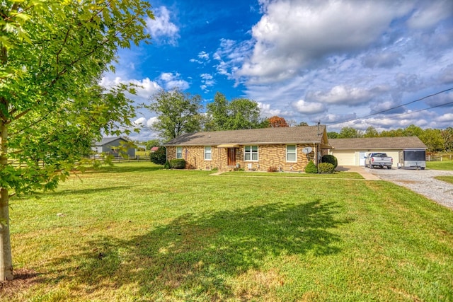 ranch-style home with stone siding, gravel driveway, and a front lawn