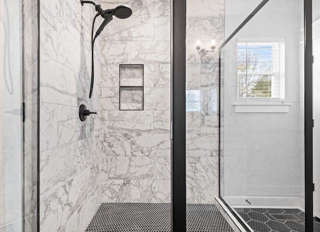 bathroom featuring a shower stall