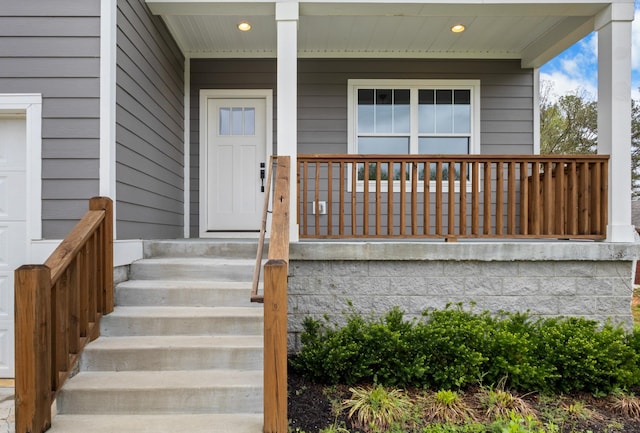 property entrance with covered porch