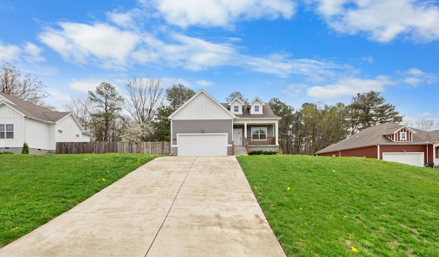 view of front of property with a front yard, a porch, fence, and driveway