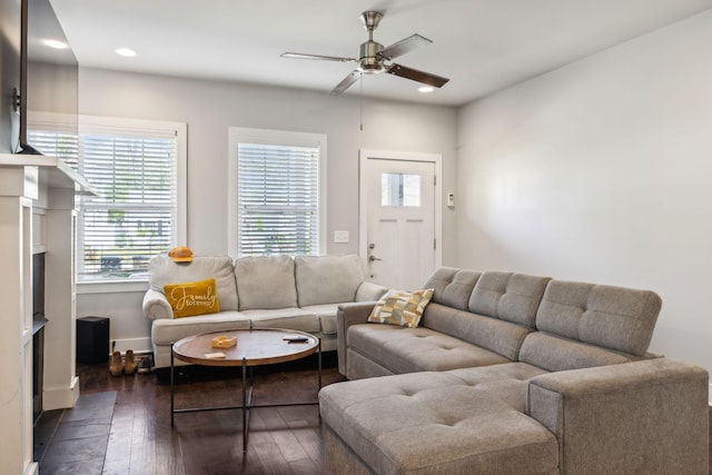 living room with recessed lighting, baseboards, a ceiling fan, and dark wood-style floors