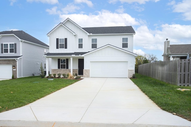 1714 Allwood Ave E, Murfreesboro, TN 37128 - view of front of home featuring board and batten siding, concrete driveway, fence, and a front lawn