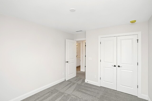 1714 Allwood Ave E, Murfreesboro, TN 37128 - unfurnished bedroom featuring a closet, carpet flooring, baseboards, and visible vents