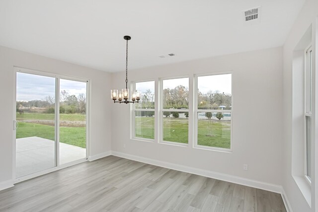 1714 Allwood Ave E, Murfreesboro, TN 37128 - unfurnished dining area with visible vents, light wood finished floors, a notable chandelier, and baseboards